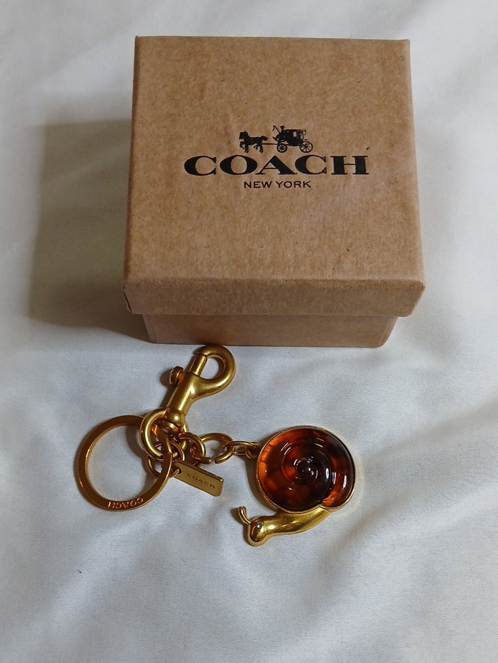 Coach Gold-tone Keychain Charm with Amber Snail Accent